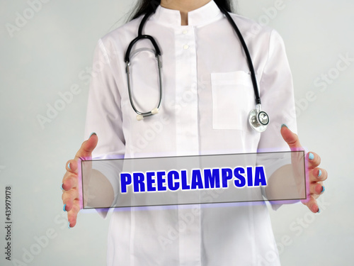  PREECLAMPSIA sign on the piece of paper. photo