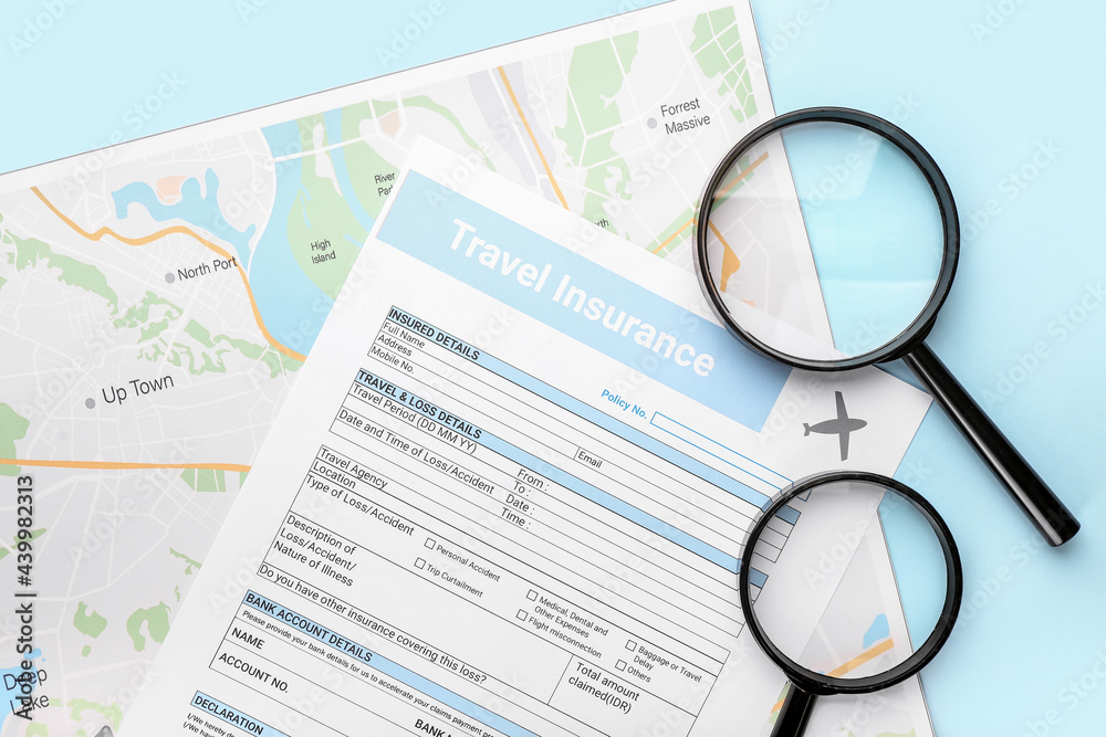 Travel insurance with magnifier glasses and map on color background Travel insurance with magnifier glasses and map on color background
