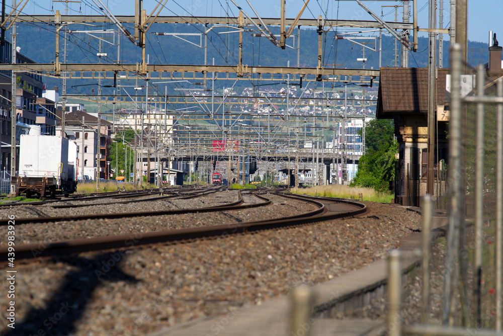 Railway track field at train station Zurich Schlieren at sunny summer day. Photo taken June 15th, 2021, Schlieren, Switzerland. Railway track field at train station Zurich Schlieren at sunny summer day. Photo taken June 15th, 2021, Schlieren, Switzerland.