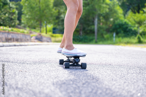 girl play surfskate in park