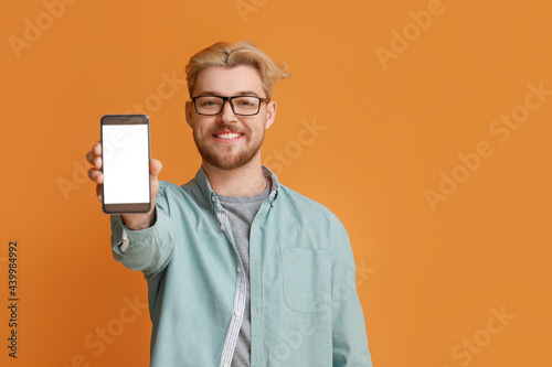 Handsome man with mobile ph...