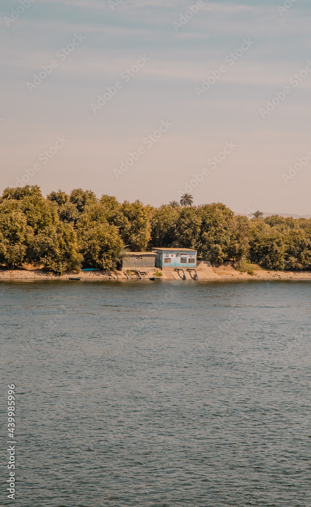 Vertical view of a floating boat service station on the Nile River near Edfu, Egypt Vertical view of a floating boat service station on the Nile River near Edfu, Egypt