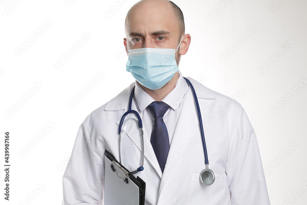 Portrait of professional man in mask with stethoscope, isolated on white background Portrait of professional man in mask with stethoscope, isolated on white background
