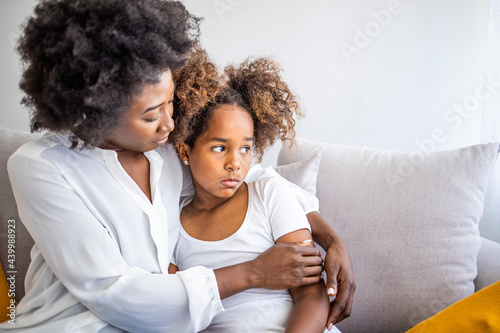 фотографія Loving mother consoling or trying make peace with insulted upset stubborn kid da