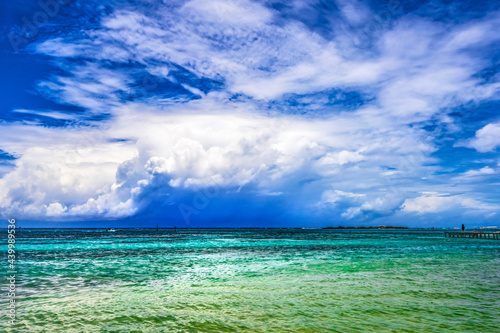 Fototapeta Naklejka Na Ścianę i Meble -  Rain Storm Coming Pier Blue Water Moorea Tahiti