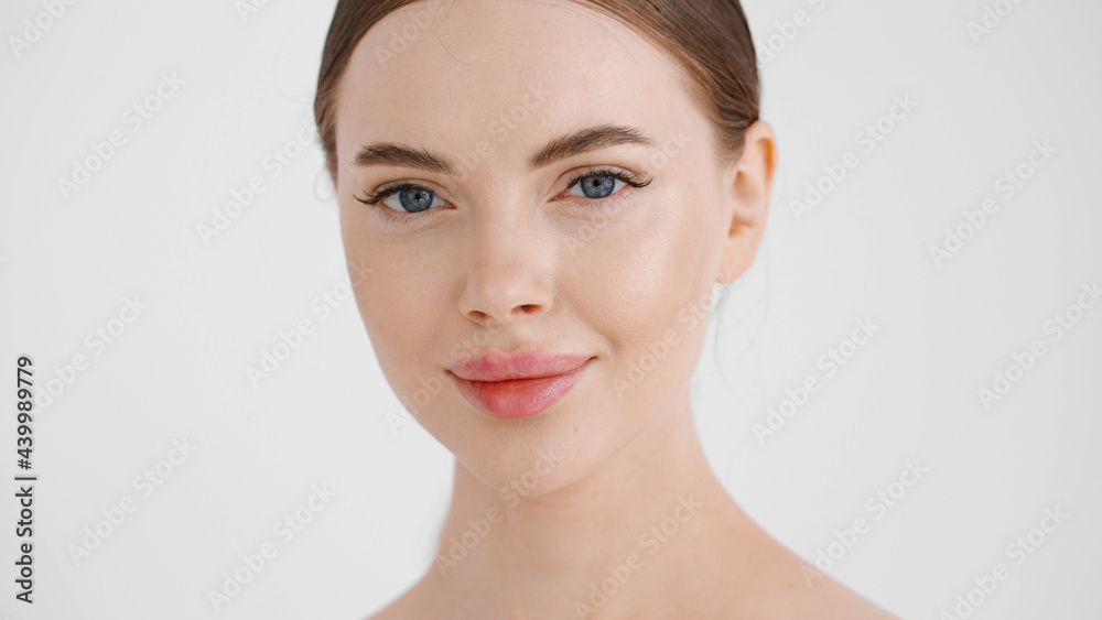 Beautiful woman clean skin healthy beauty face close up natural make up isolate don white natural 