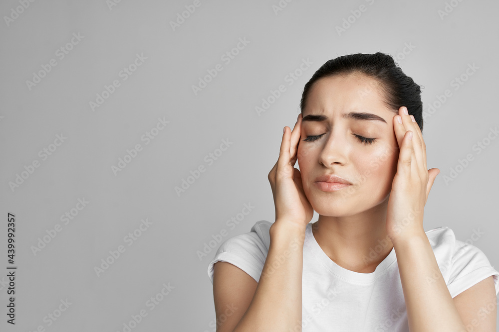 woman with headache discontent health problems close up woman with headache discontent health problems close up