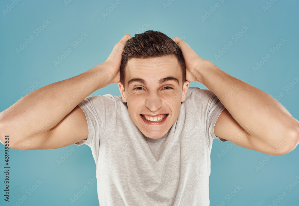man smile emotion blue background lifestyle close up man smile emotion blue background lifestyle close up