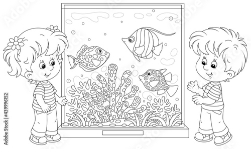 Happy little kids walking around a zoological garden and watching funny tropical fishes swimming in a large aquarium with amazing corals, black and white outline vector cartoon illustration