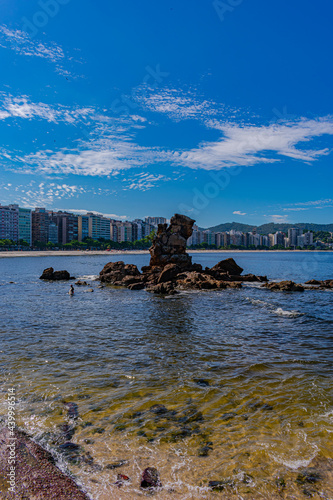 Niterói, Rio de Janeiro, Brazil - CIRCA 2021: Image of rock formations (stones), with texture and sharpness, on the beach during the day photo