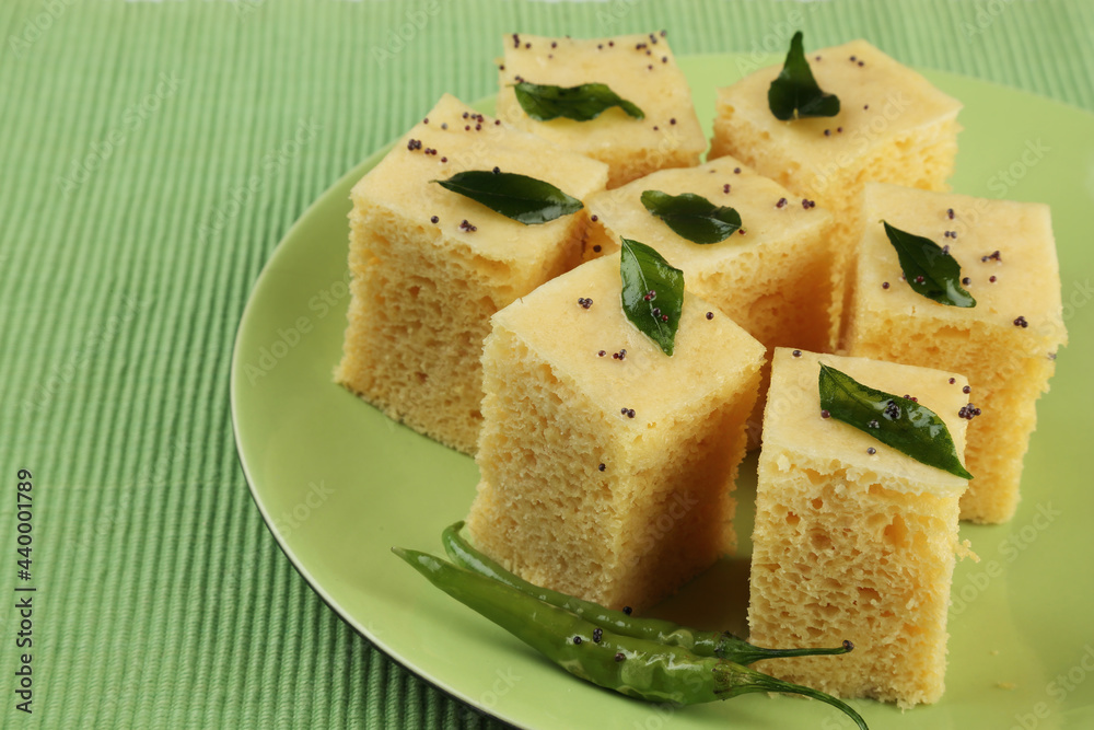 Gujarati Khaman Dhokla made using Chana Dal, served with Green chutney