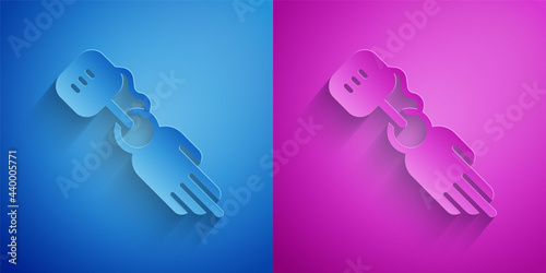 Paper cut Prosthesis hand icon isolated on blue and purple background. Futuristic concept of bionic arm, robotic mechanical hand. Paper art style. Vector