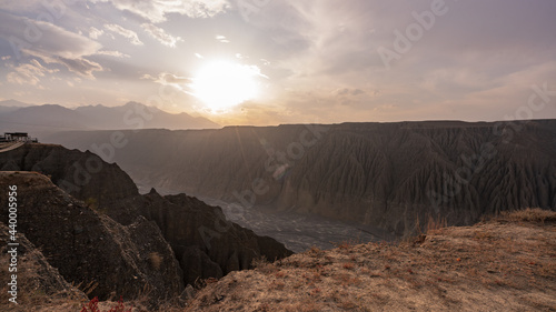 Dushanzi Grand Canyon in Karamay, Xinjiang, with the sun shining brightly over the Kuitun River photo