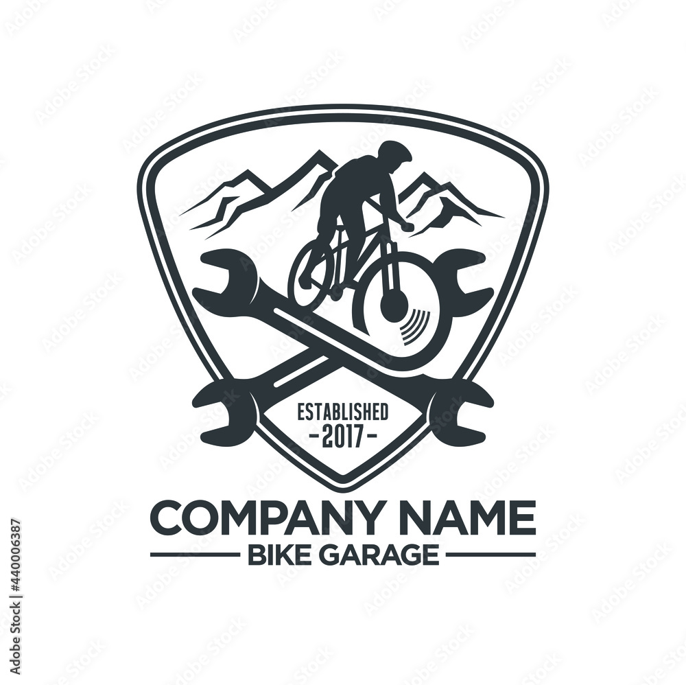 wrench and mountain bike illustration, badge logo style for bike garage.