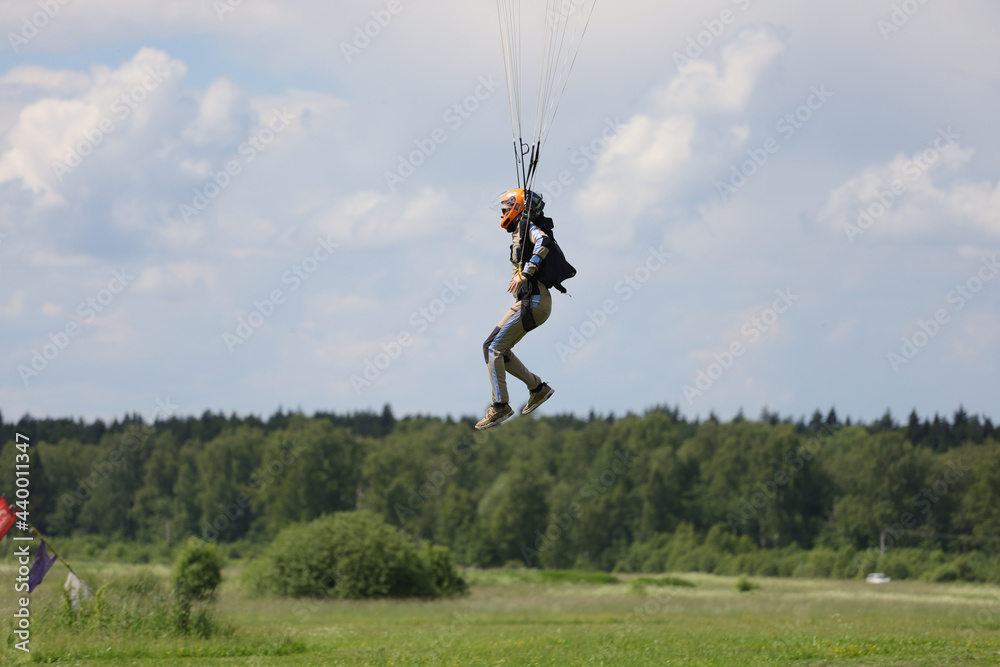 Skydiving. A skydiver is landing.
