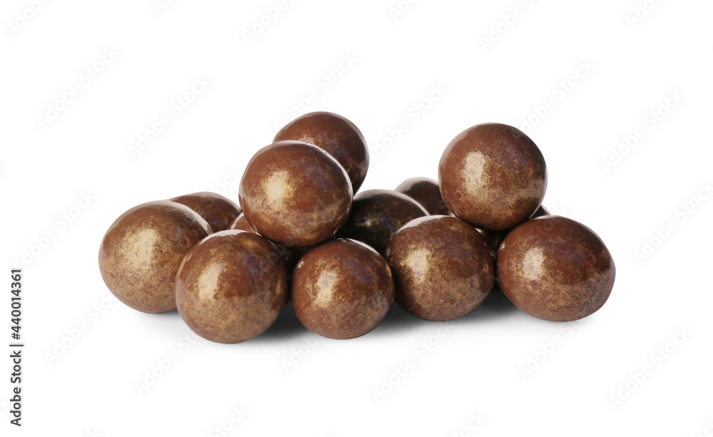 Delicious golden chocolate candies on white background