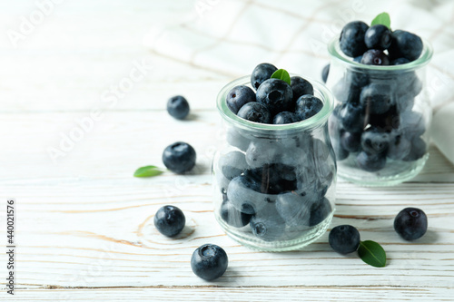 Fresh berry concept with blueberry on white wooden table
