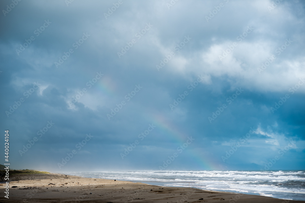 Storm Clouds & Rainbow over the sea, Karamea, West Coast, New Zealand