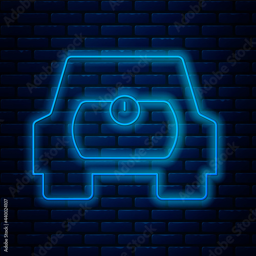 Glowing neon line Gas tank for vehicle icon isolated on brick wall background. Gas tanks are installed in a car. Vector