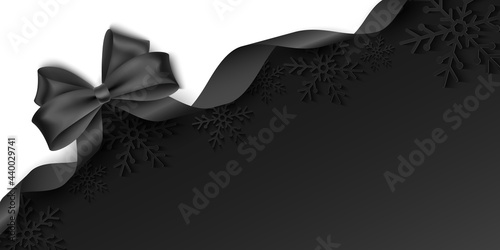 Vector template with black bow and ribbon for advertising your promotion, sale or festive event. Seasonal background with christmas paper snowflakes.