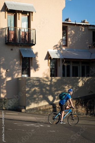 Photography caucasian man male cycling bike road sunrise riding city home house building sha