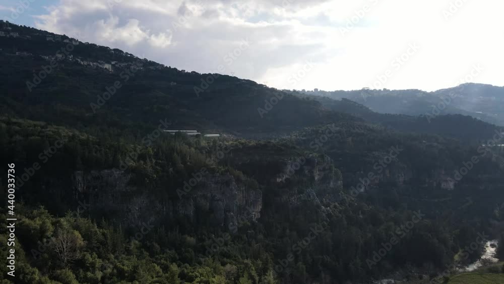 Drone shot flying over Damour River in the Chouf Mount Lebanon region Drone shot flying over Damour River in the Chouf Mount Lebanon region