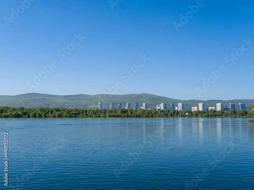The Yenisei River. View of the city of Krasnoyarsk. Summer sunny day. Clear sky