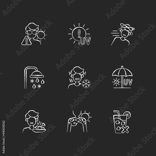 Heatstroke risk during summer chalk white icons set on dark background. Sunburn on skin. UV rays exposure during summer. Avoid sunlight. Isolated vector chalkboard illustrations on black