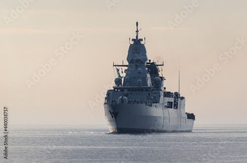 WARSHIP - Guided missile frigate flows to the port photo