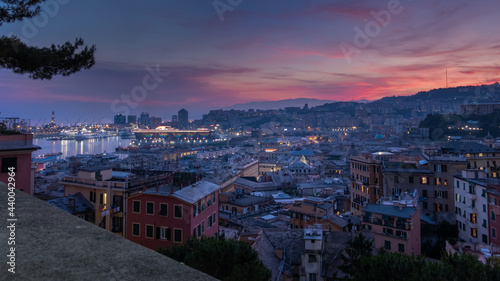 Fototapeta Naklejka Na Ścianę i Meble -  View of the port of Genoa at sunset from Spianata Castelletto, Italy.