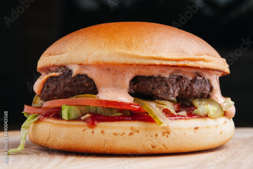 Fast food Burger, Chicken, Meat, Different type of sandwiches on a black background.