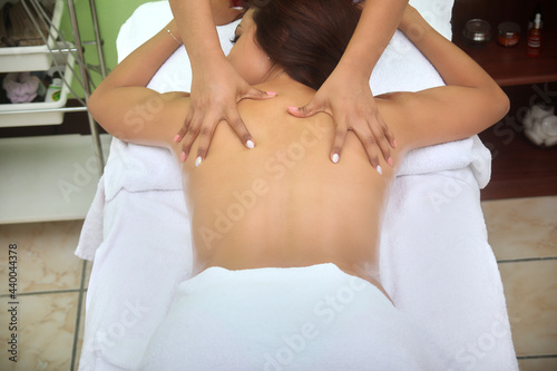 Latin woman receives massage for weight reduction