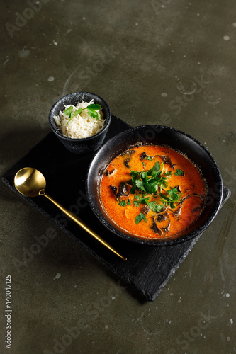 Tom Yam with salmon, shrimps and tree mushrooms