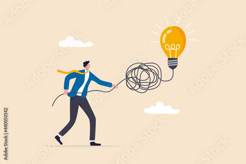 Simplify complex business idea, untangle or solve business problem, solution for messy chaos situation concept, smart businessman untangle messy line of business idea lightbulb or simplify problem.