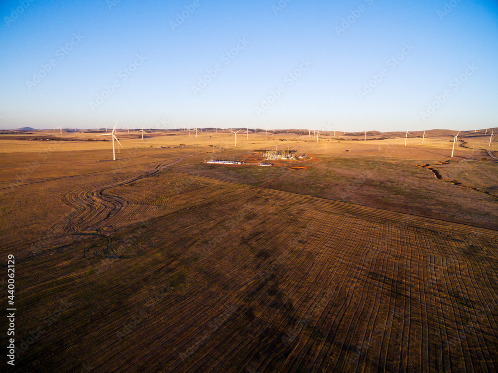 Drone shot of wind turbines and battery Drone shot of wind turbines and battery
