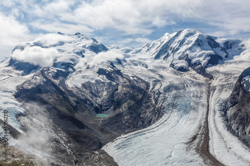 Panorama of cloud layer from mountain top over Swiss alps