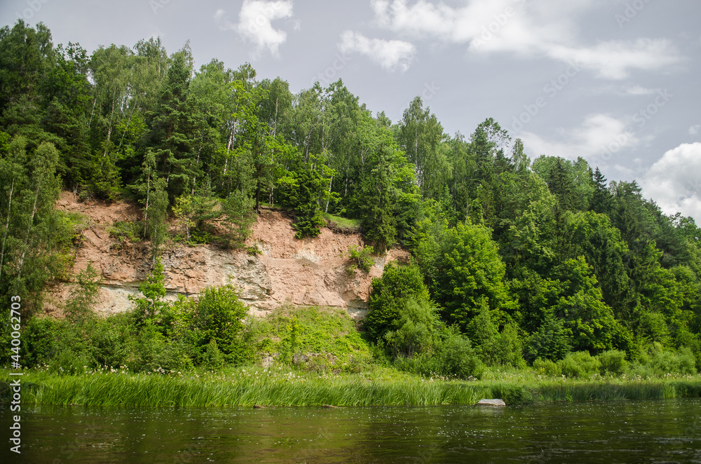 Sandstone cliffs on the banks of the Venta River, Latvia. Sandstone cliffs on the banks of the Venta River, Latvia.