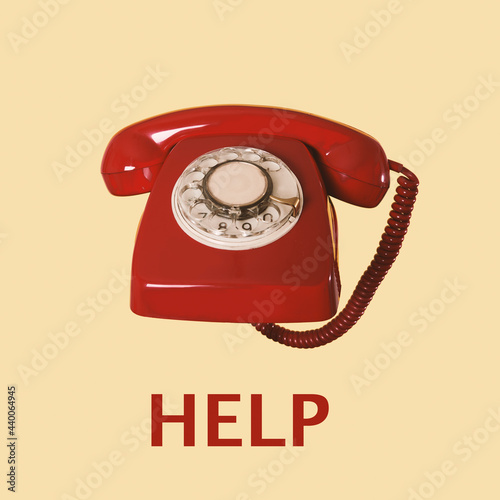 red dial telephone and text help photo