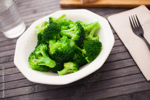 healthy food. steamed broccoli inflorescences in a bowl