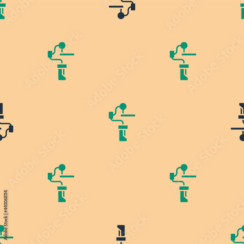 Green and black Gimbal stabilizer for camera icon isolated seamless pattern on beige background. Vector