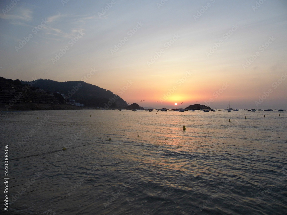 sunset over the sea sunset over the sea