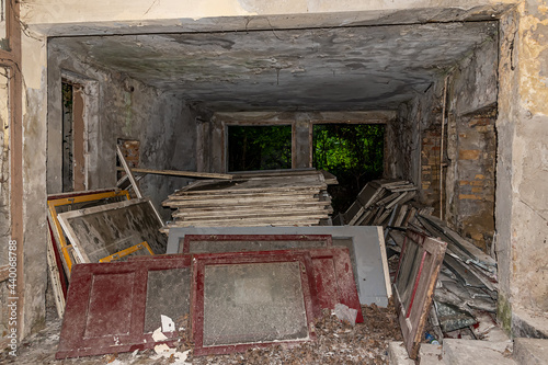 removed old doors and windows in an abandoned warehouse