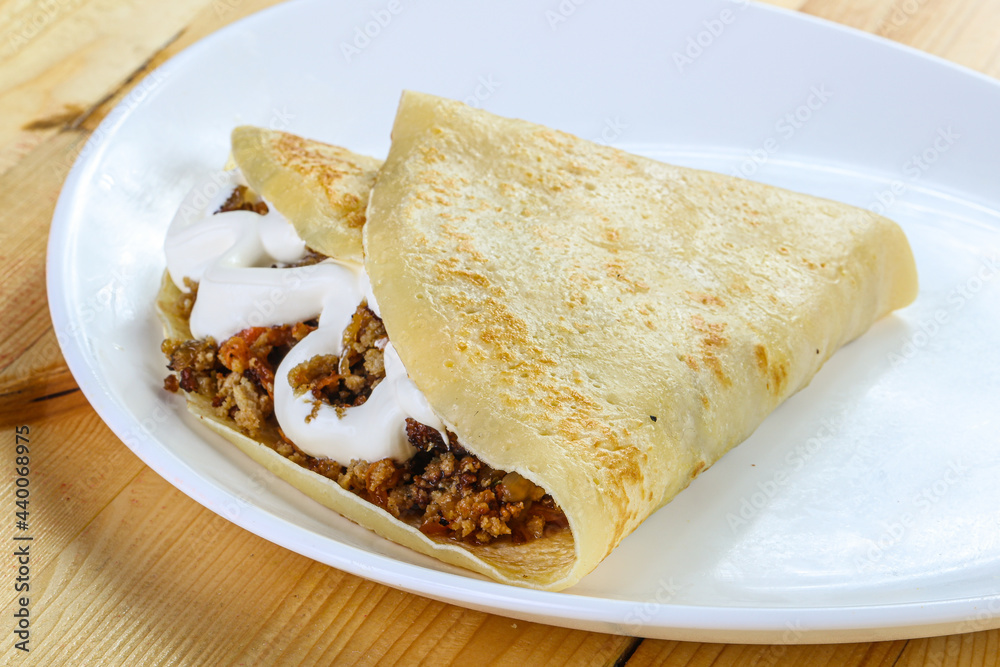 Pancake with minced meat and sauce Pancake with minced meat and sauce