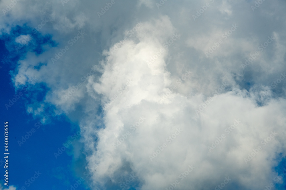 Fluffy white clouds and a blue background Fluffy white clouds and a blue background