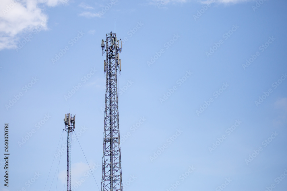 transmitter atop a cell phone pole About to be upgraded from 4g to 5g. High-risk electrical engineer job in Thailand.