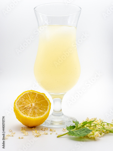 Vertical closeup shot of socata, a Romanian drink made from fermented elderberries photo