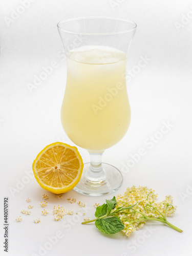 Vertical shot of the Romanian seasonal drink, socata, made from fermented elderberries photo