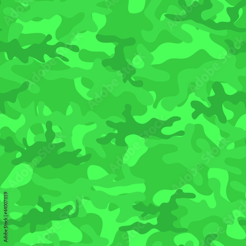 Abstract seamless camouflage of salad color. Vector.