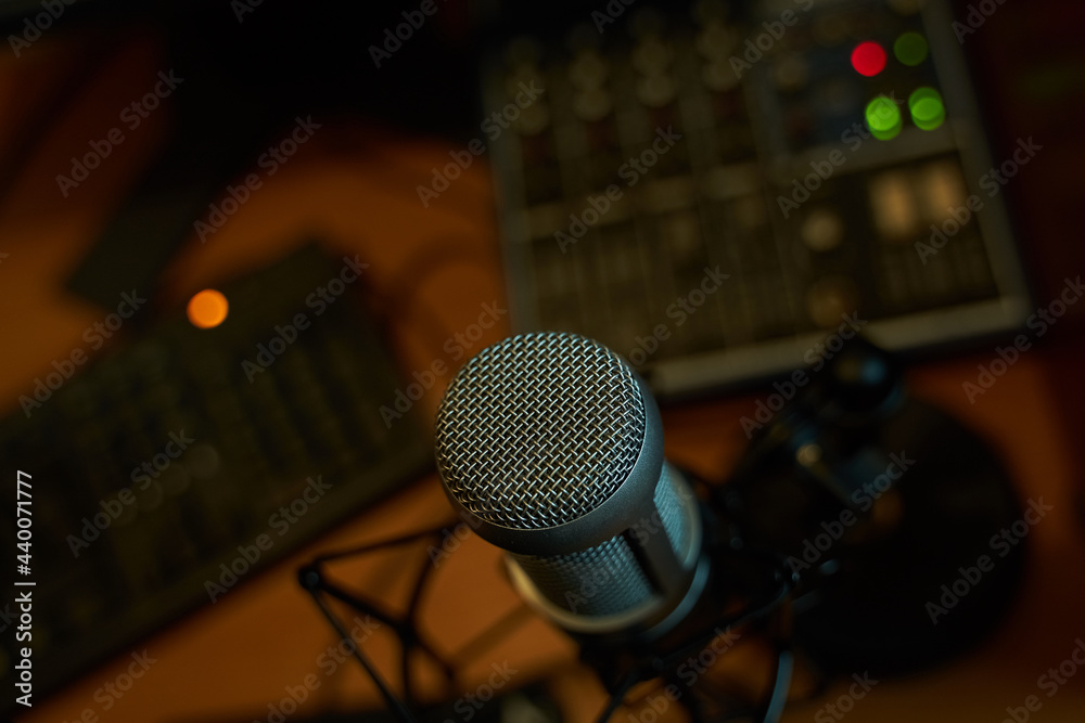 Podcast Setup with Professional Microphone in Dark Mood Podcast Setup with Professional Microphone in Dark Mood