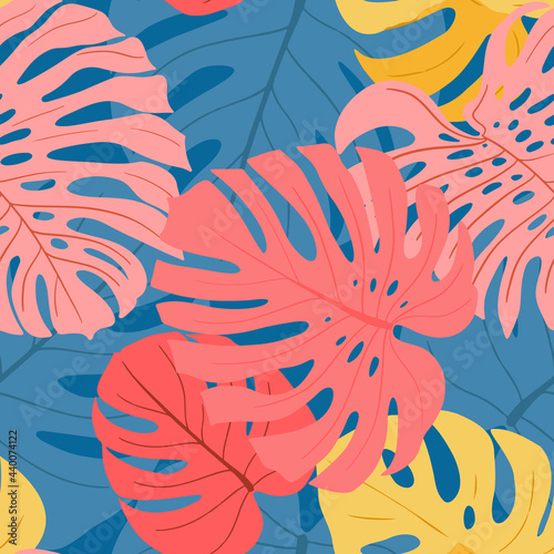 Seamless pattern with Monstera palm leaves in bright blue  yellow and pink 